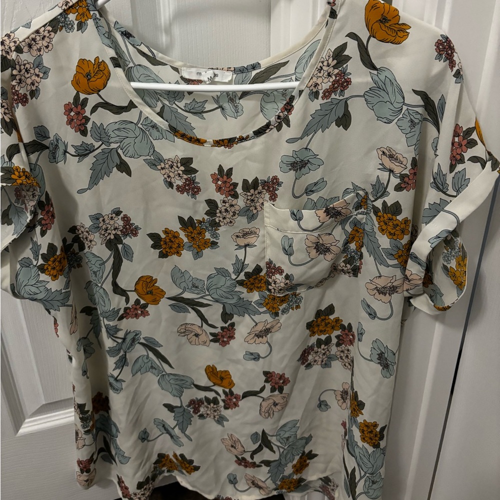 Maurice’s blouse. Worn one time. Super pretty colors. Size medium.